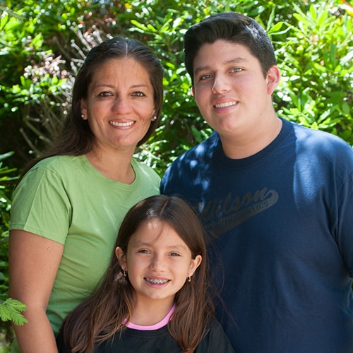 Family smiling Wilson & Kim Orthodontics in Novato, CA